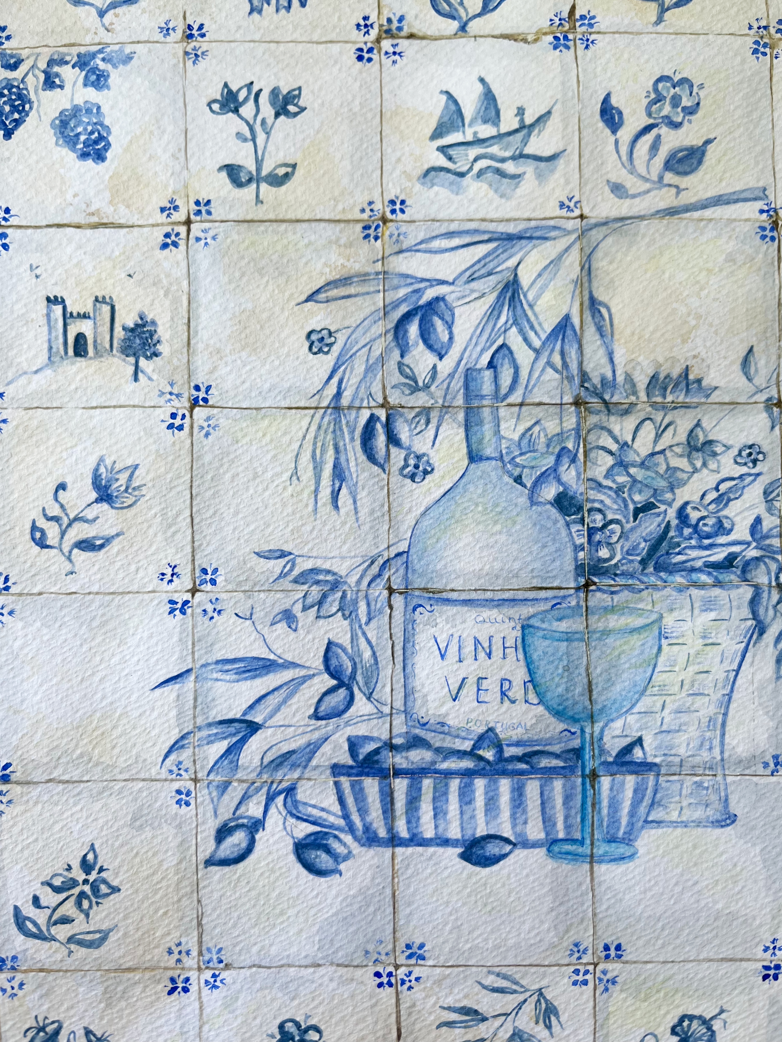 blue tile with wine and olives